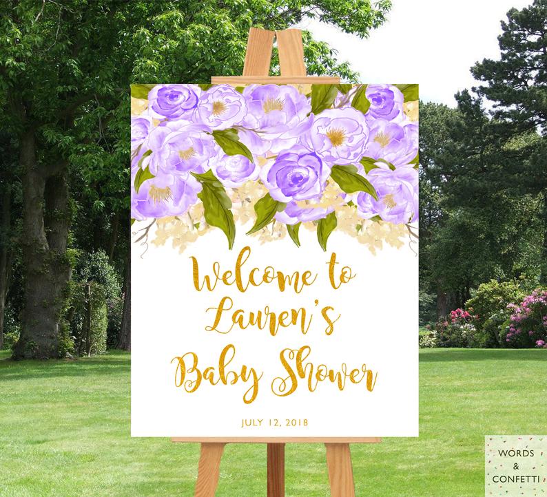 gold-and-purple-baby-shower-decorations-words-and-confetti